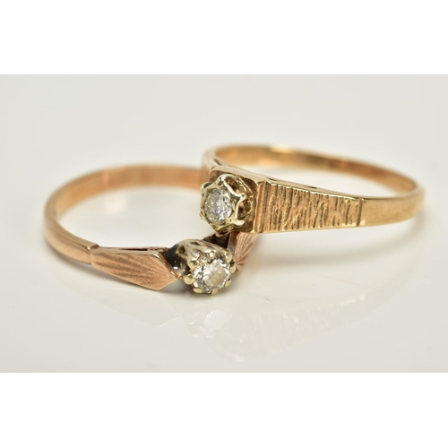 10 - TWO 9CT GOLD SINGLE STONE DIAMOND RINGS, the first designed with a raised claw set round brilliant c... 