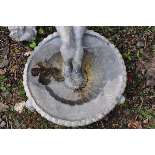 1002 - A VINTAGE LEAD BIRD BATH in the form of a child standing on a scalloped footed platter (head detache... 