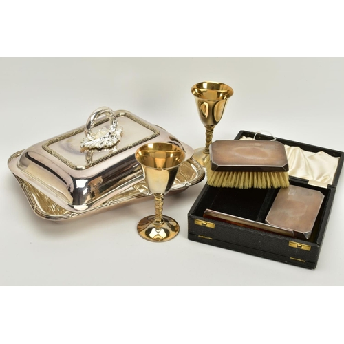 109 - A SELECTION OF METALWARE, to include a black cased gentlemans dressing table set, silver brush set w... 