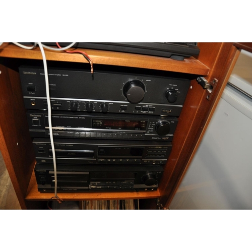 1123 - A TECHNICS COMPONANT HI FI in a teak cabinet including a RS-B565 tape player, a SL-PG200A CD player,... 