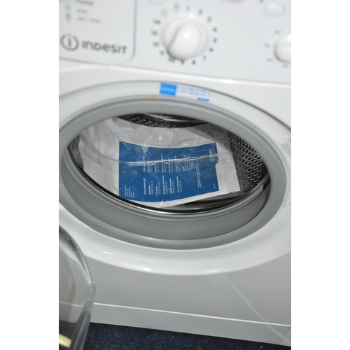 1124 - AN INDESIT IWC81482 WASHING MACHINE (PAT and working)