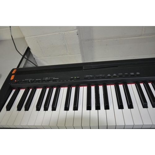 1127 - A YAMAHA P-95 DIGITAL PIANO, with Yamaha Sustain Pedal, folding stand and stool (PAT pass and all ke... 