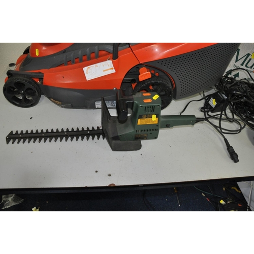 1131 - A FLYMO C34C ELECTRIC LAWN MOWER with grass box, three garden rock lights with power supply (both PA... 