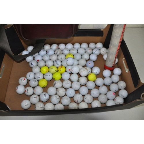 1137 - A TRAY CONTAINING A QUANTITY OF GOLF BALLS and twoTop Flite caps