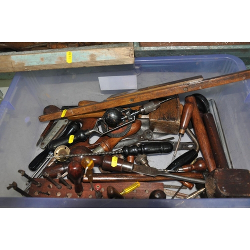 1138 - TWO VINTAGE WOODEN CARPENTERS TOOL BOXES and a tray containing tools including hand drills, bit and ... 