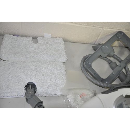 1150 - A SHARK STEAM POCKET MOP, with attachments and bag (PAT pass and working looks unused)