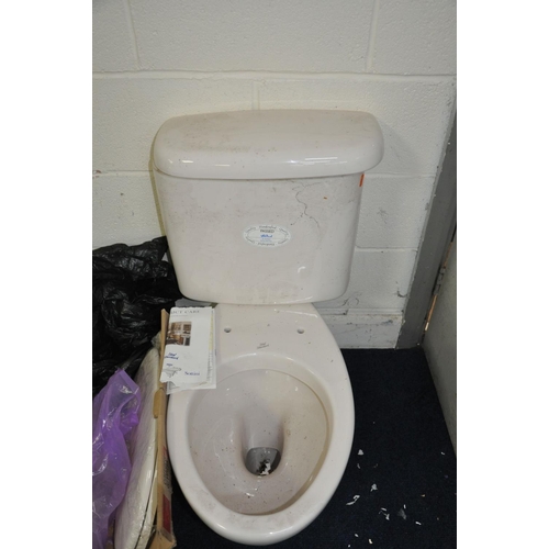 1158 - A BRAND NEW IDEAL STANDARD TOILET with new seat and cistern in a pale pink finish