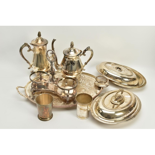 116 - A QUANTITY OF METALWARE, to include items such as a large silver plated oval footed foliate embossed... 