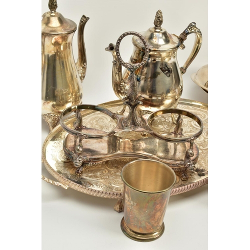 116 - A QUANTITY OF METALWARE, to include items such as a large silver plated oval footed foliate embossed... 