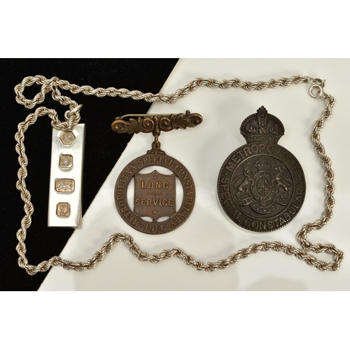 120 - A SILVER INGOT PENDANT NECKLACE AND TWO MEDALS, the silver ingot hallmarked Sheffield, suspended fro... 