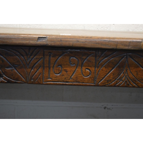 1206 - A 17TH CENTURY AND LATER OAK SERVING TABLE, double plank top, carved lunettes to frieze, on a jointe... 