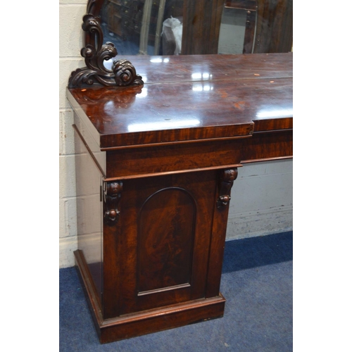 1208 - A VICTORIAN MAHOGANY MIRRORBACK PEDESTAL SIDEBOARD, carved foliate decoration, inverted breakfront, ... 