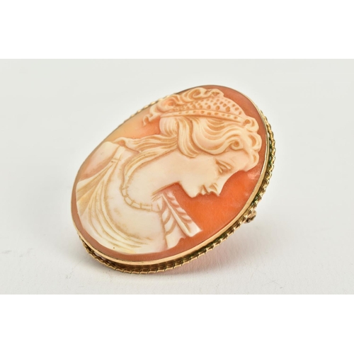 122 - A 9CT GOLD CAMEO BROOCH/PENDANT, of oval design depicting a lady in profile, collet mount and rope t... 