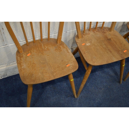 1221 - A SET OF THREE DISTRESSED ERCOL BLOND ELM AND BEECH HOOP SPINDLE BACK CHAIRS