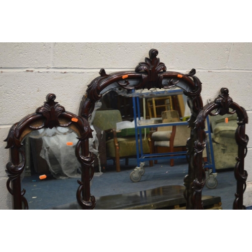 1226 - A DISTRESSED VICTORIAN MAHOGANY WALL MOUNTED CONSOLE TABLE, the triple mirror back with foliate vine... 