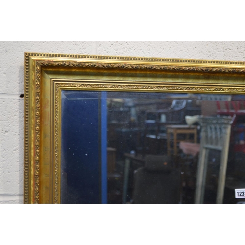 1233 - A MODERN GILT WOOD BEVELLED EDGE WALL MIRROR, 106cm x 76cm, together with another wall mirror (2)