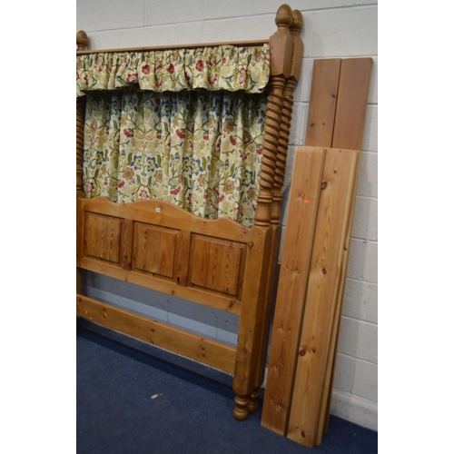 1235 - A PINE 4' BARLEY TWIST FOUR POSTER FULL TESTER BED FRAME, with side rails, slats and floral drapes, ... 