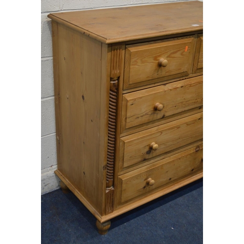 1237 - A PINE CHEST OF TWO SHORT OVER THREE LONG DRAWERS, flanked with barley twist rope detail, on turned ... 