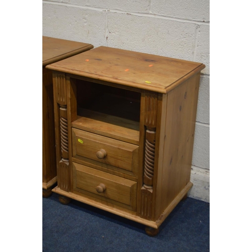 1238 - A PAIR OF PINE BEDSIDE CABINETS with two drawers, flanked with barley twist rope detail, width 54cm ... 