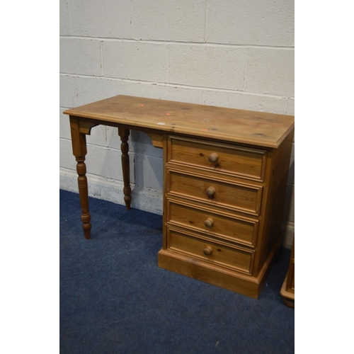 1239 - A NEAR PAIR OF OPPOSING PINE DRESSING TABLES flanked by four drawers, width 107cm x depth 48cm x hei... 