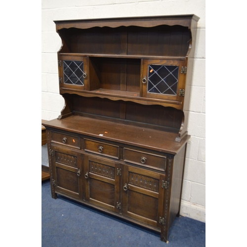 1241 - AN OAK DRESSER with three drawers, width 137cm x depth 43cm x height 182cm together with an oak hall... 