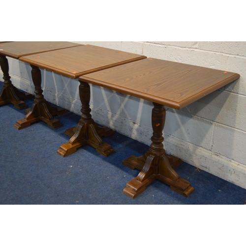 1243 - A SET OF FIVE OAK SQUARE TOPPED PUB TABLES, 68cm square x height 74cm