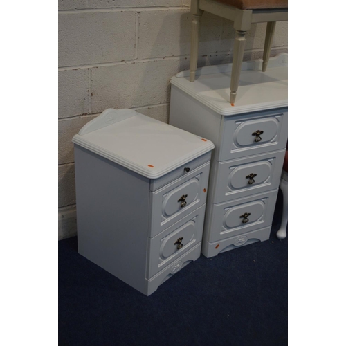 1253 - A MODERN WHITE FOUR PIECE BEDROOM SUITE, comprising a dressing table with seven drawers, separate mi... 