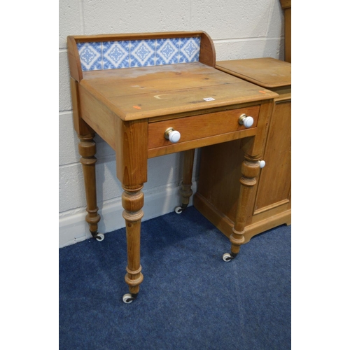 1271 - A VICTORIAN PINE WASHSTAND, with a blue tile back and a single drawer on ceramic casters, together w... 