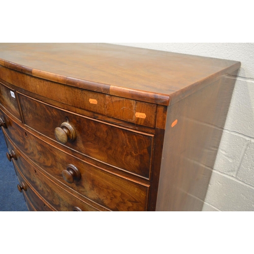 1279 - A GEORGE III FLAME MAHOGANY BOWFRONT CHEST OF TWO OVER FOUR LONG GRADUATING DRAWERS, the top with a ... 