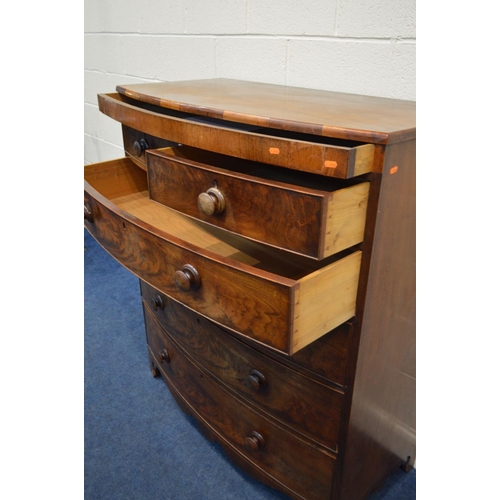 1279 - A GEORGE III FLAME MAHOGANY BOWFRONT CHEST OF TWO OVER FOUR LONG GRADUATING DRAWERS, the top with a ... 