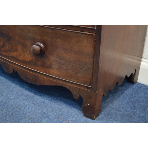 1279 - A GEORGE III FLAME MAHOGANY BOWFRONT CHEST OF TWO OVER FOUR LONG GRADUATING DRAWERS, the top with a ... 