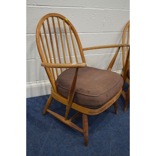 1280 - A PAIR OF ERCOL WINDOR MODEL 334E BEECH EAST ARMCHAIRS, the hoop back with spindles, spring seat and... 