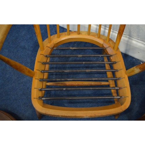 1280 - A PAIR OF ERCOL WINDOR MODEL 334E BEECH EAST ARMCHAIRS, the hoop back with spindles, spring seat and... 