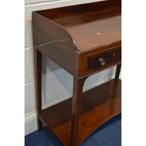 1281 - A GEORGIAN MAHOGANY WASHSTAND, gallery top, two crossbanded front frieze drawers, on square tapering... 