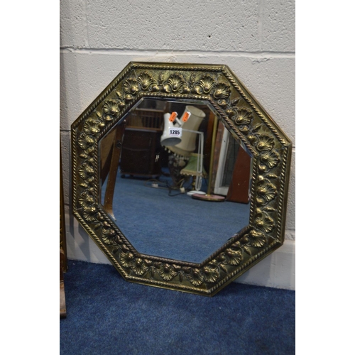 1285 - A FOLIATE BRASS FRAMED OCTAGONAL WALL MIRROR, together with two other wall mirrors and a shield shap... 