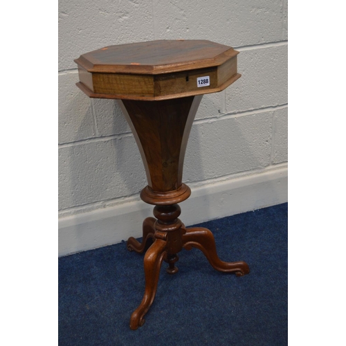 1288 - A VICTORIAN WALNUT TRUMPET WORK TABLE with integral assorted compartments supported on shaped tripod... 