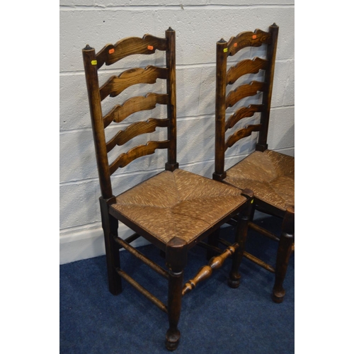 1294 - AN EARLY TO MID 20TH CENTURY OAK OVAL TOPPED GATE LEG TABLE, together with a set of five rush seated... 