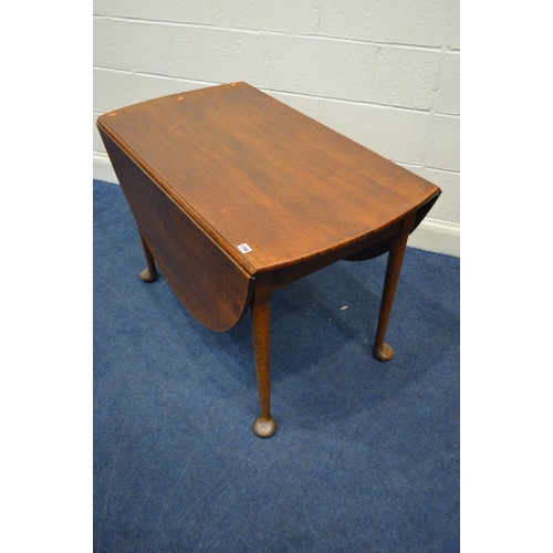 1298 - AN EARLY TO MID CENTURY OAK OVAL GATE LEG TABLE, on pad feet open width 150cm x closed width 60cm x ... 