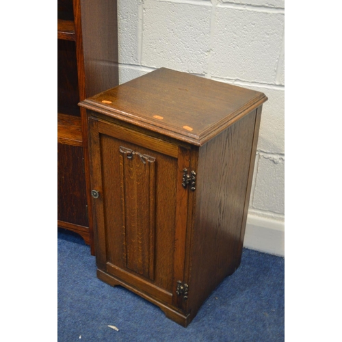 1299 - AN EARLY TO MID 20TH CENTURY OAK OPEN BOOKCASE with three fixed shelves under a double door cupboard... 