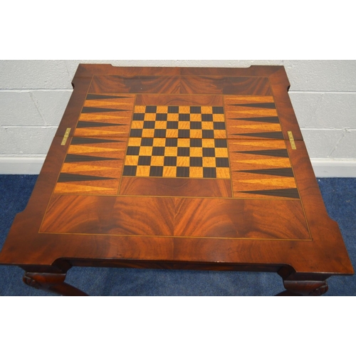 1313 - A REPRODUCTION MAHOGANY CONCERNTINA CARD TABLE, double fold over top enclosing an olive green leathe... 