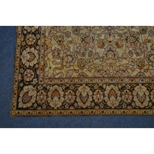 1355 - A KAYSERI FINE WOOL RUG, of a russet, cream and black ground, 292cm x 148cm (sd and worn fraying edg... 