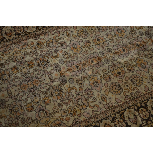 1355 - A KAYSERI FINE WOOL RUG, of a russet, cream and black ground, 292cm x 148cm (sd and worn fraying edg... 