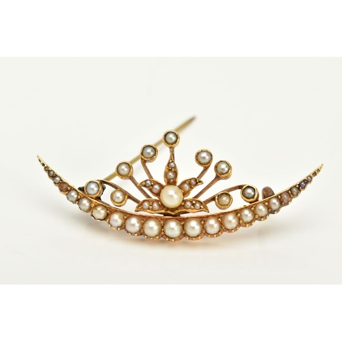 15 - A YELLOW METAL CULTURED PEARL CRESCENT BROOCH, the crescent set with a row of  graduated split pearl... 