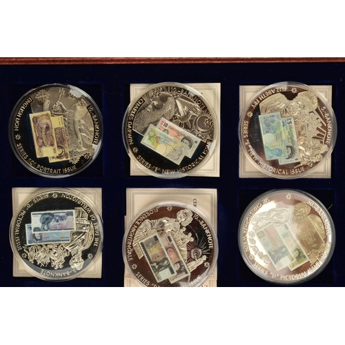 158 - A BOXED TWELVE SET OF WINDSOR MINT BRITISH BANKNOTE COMMEMORATIAVE COIN COLLECTION, housed in a wood... 