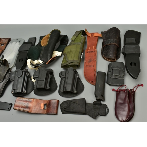 257 - A COLLECTION OF HOLSTERS AND LEATHER ITEMS comprising of two unnamed leather shoulder holsters, thre... 