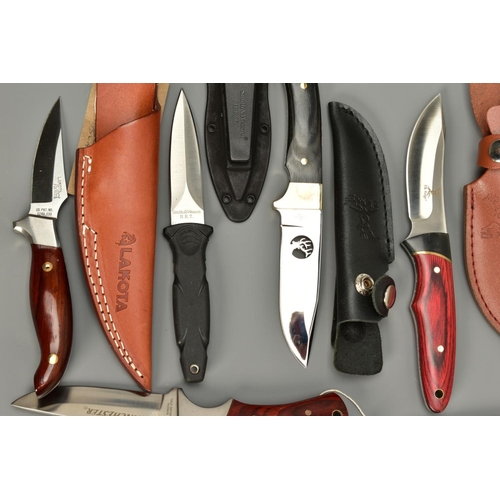 275 - A NUMBER OF SHEATH KNIVES EACH WITH A HOLSTER comprising of Crazy River, two x Elk Ridge, Lakota, TK... 