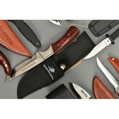 275 - A NUMBER OF SHEATH KNIVES EACH WITH A HOLSTER comprising of Crazy River, two x Elk Ridge, Lakota, TK... 