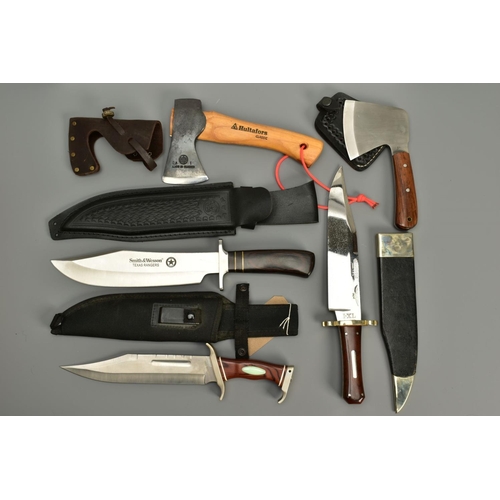 279 - A NUMBER OF BOWIE KNIVES AND HAND AXES ALL WITH SHEATHS consisting of a Bowie Knife by G Wosten Holm... 