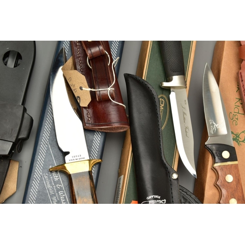 285 - A COLLECTION OF KNIVES consisting of Smith & Wesson Texas Hold-em small bowie knife in sheath, Smith... 