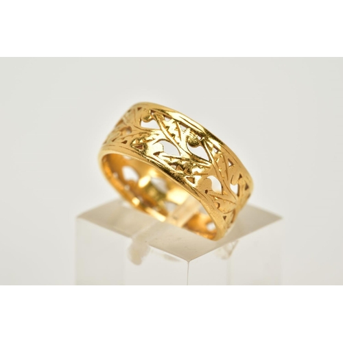 33 - A MID 20TH CENTURY 22CT GOLD ORNATE PIERCED BAND RING, flat section measuring approximately 7.5mm in... 